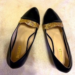 BeTllex black heels with gold glitter trim and heels